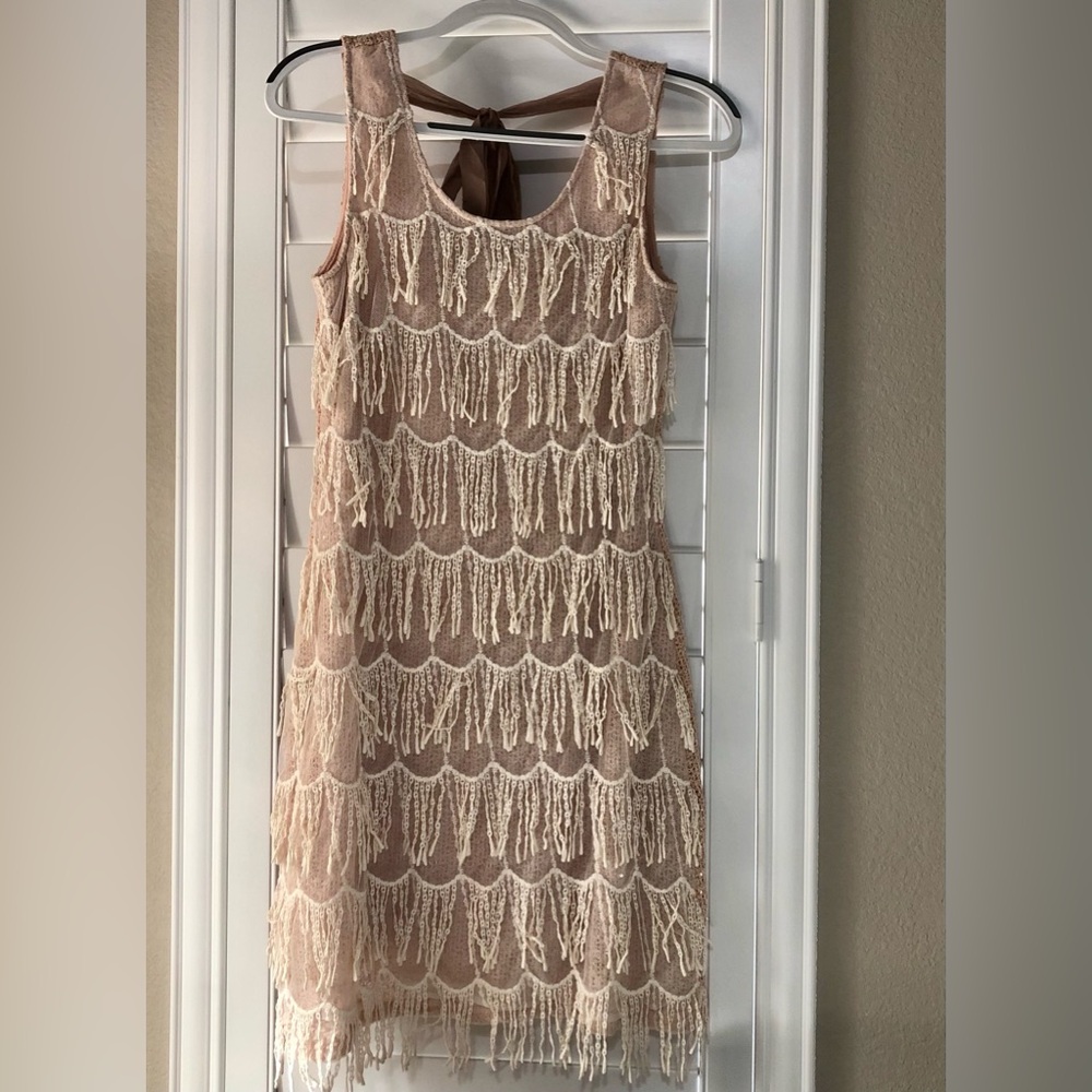 NWT. Sassy but sophisticated dress. Size M.